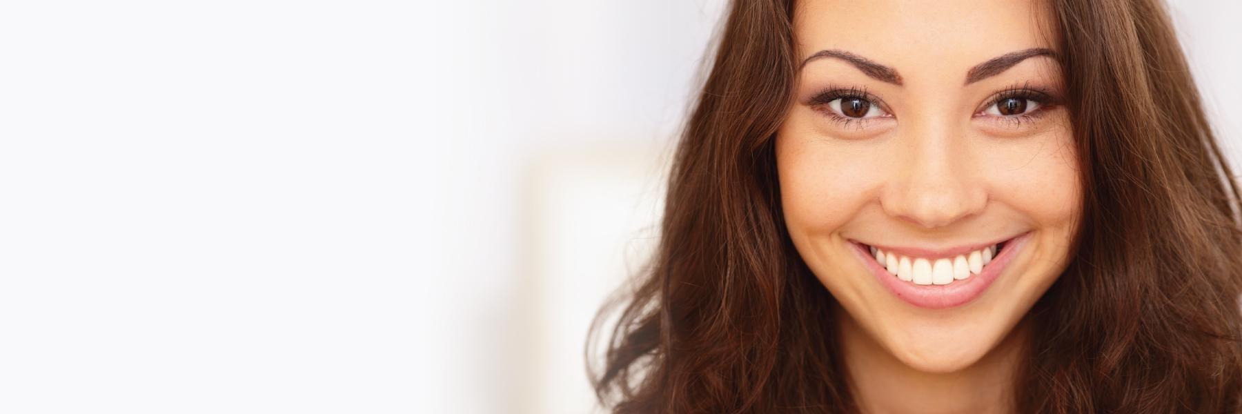 woman smiling after dental fillings 